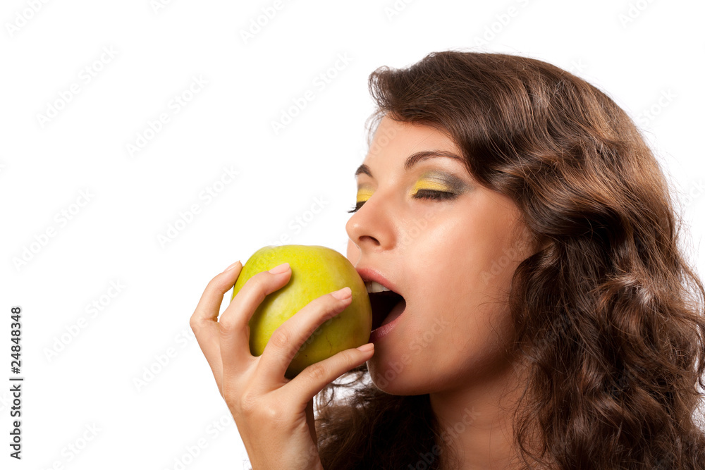 Woman biting apple Woman biting apple