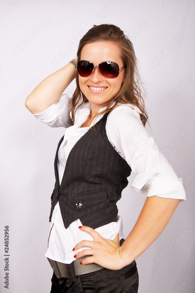Portrait of a beautiful young female entrepreneur in sunglasses Portrait of a beautiful young female entrepreneur in sunglasses