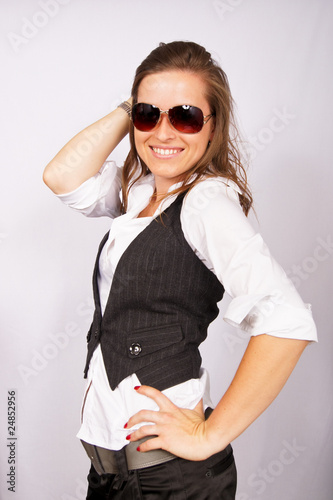 Portrait of a beautiful young female entrepreneur in sunglasses