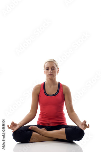 Lotus position - Woman practicing yoga © Kenneth Man