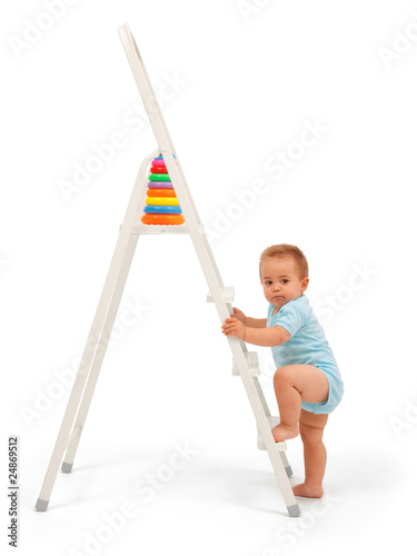 Baby boy on ladder