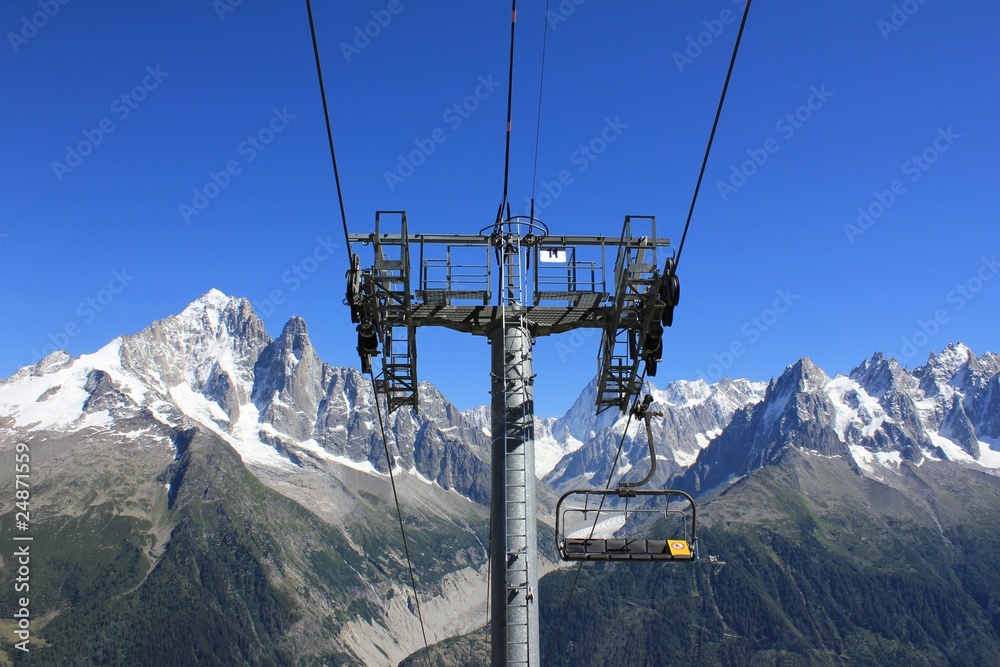 chair lift and mountains and sky blue
