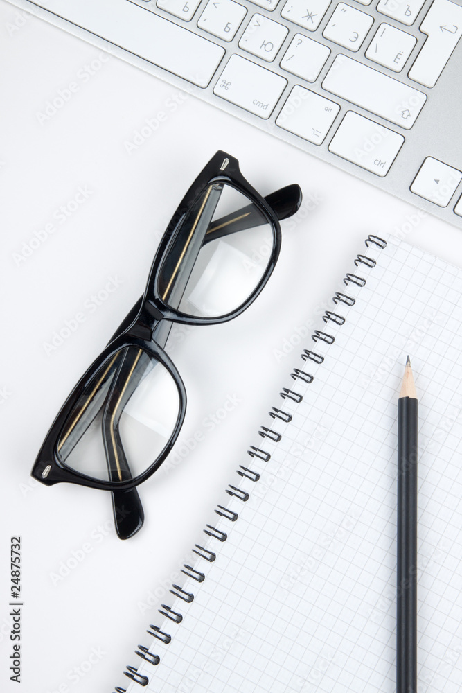 Office desk with glasses Office desk with glasses