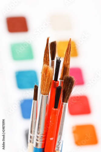 paints with brushes