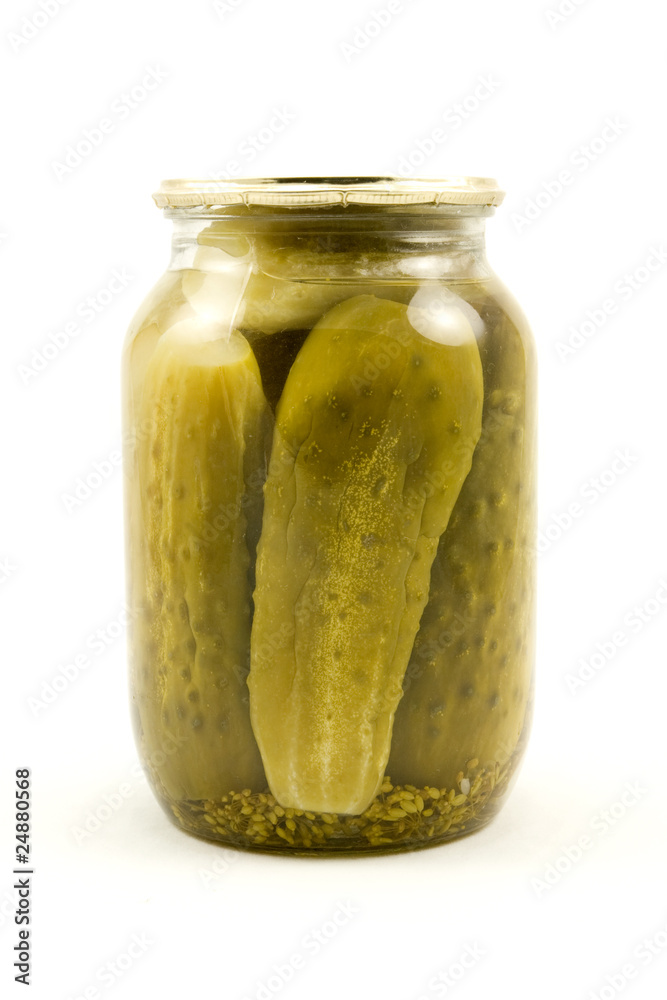 clear glass jar with cucumbers on a white background clear glass jar with cucumbers on a white background