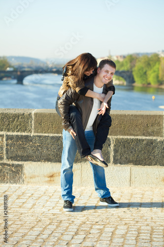Young couple on the Charles Bridge © Evgeniya Uvarova
