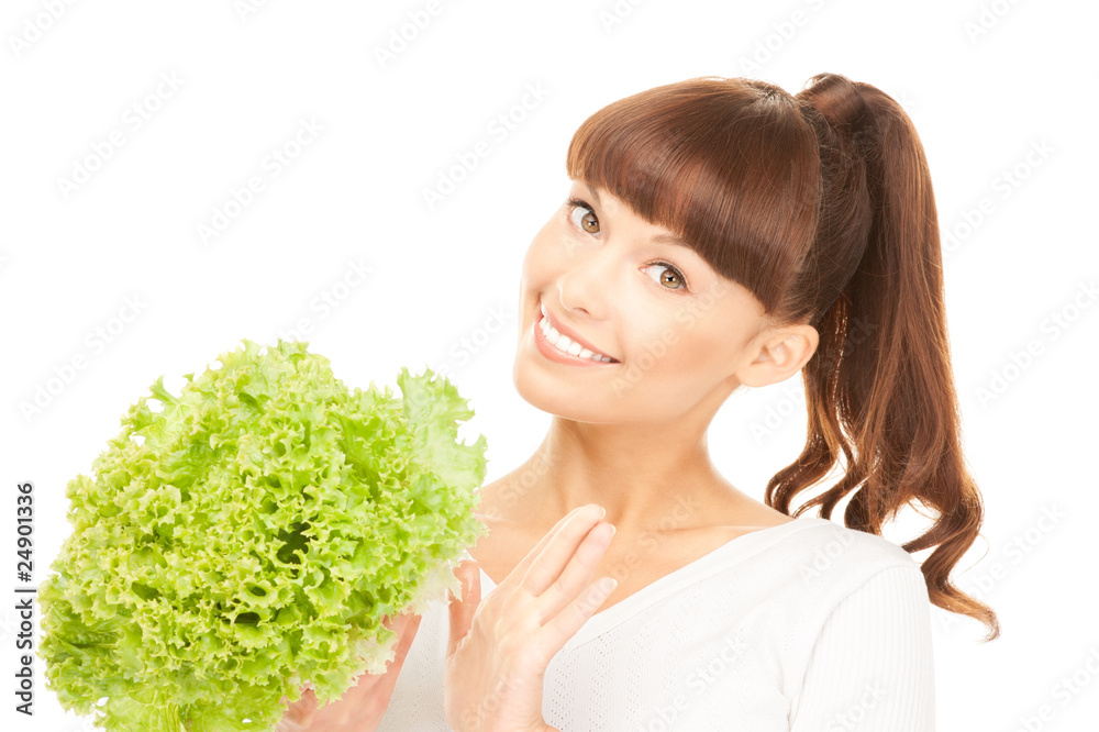 beautiful housewife with lettuce over white beautiful housewife with lettuce over white