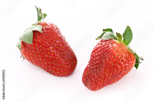 Few strawberries isolated on white
