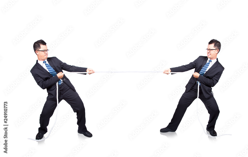 business man playing tug of war with himself. business man playing tug of war with himself.