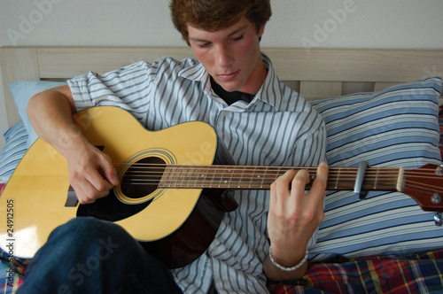 Young Man Playing Guitar