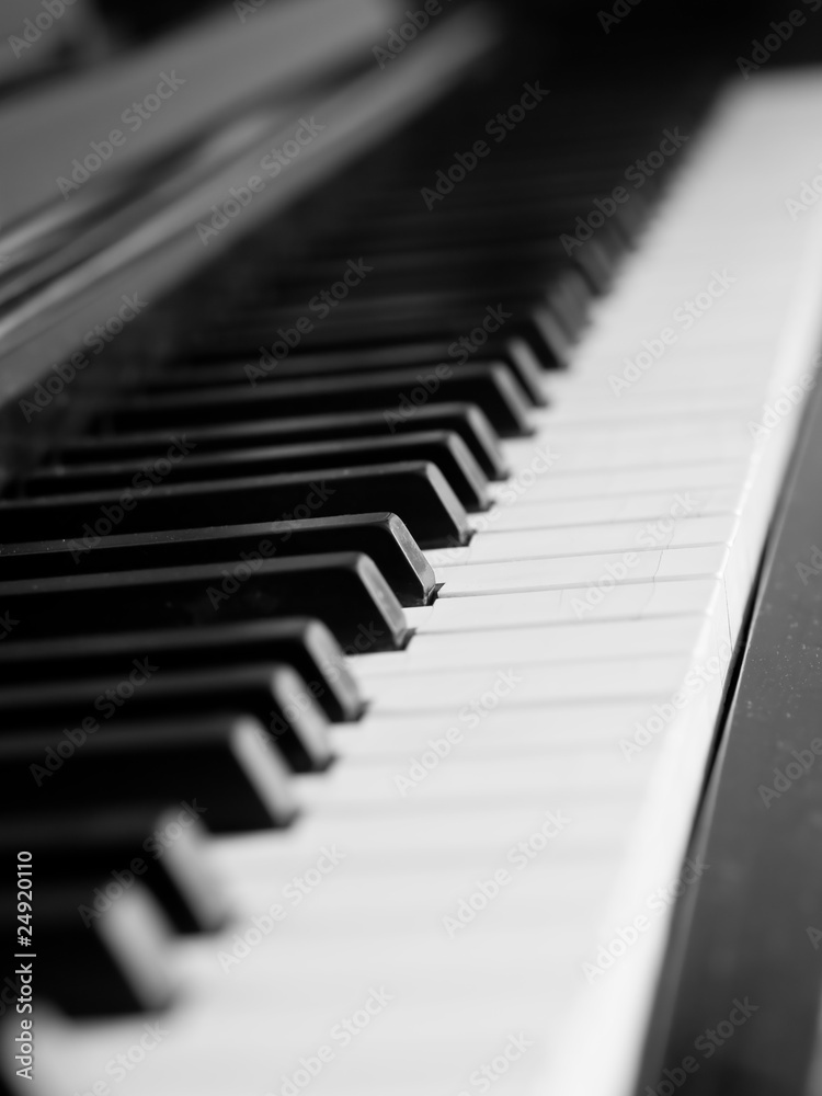 Piano keys of a very well loved and often played piano Piano keys of a very well loved and often played piano