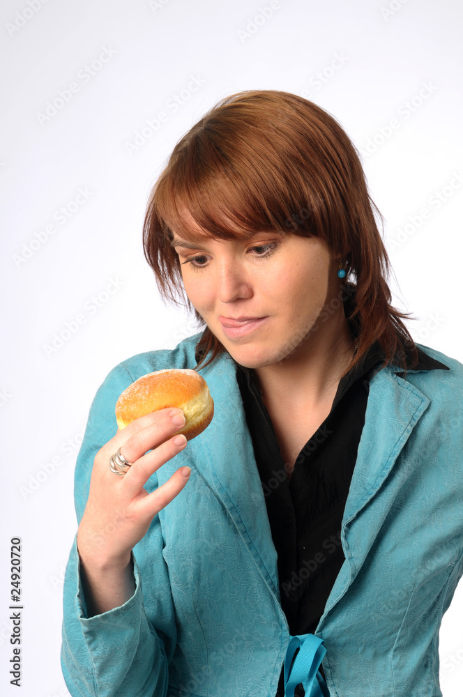 The beautiful young woman with friedcake The beautiful young woman with friedcake