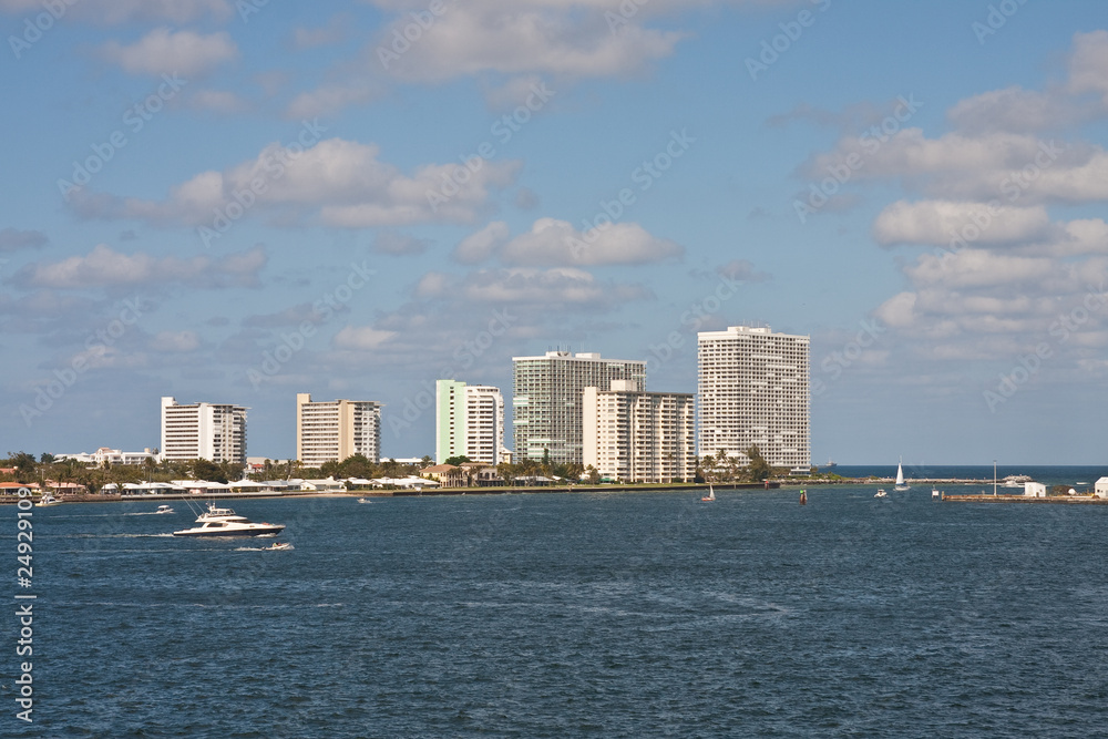 Fototapeta premium White Yachts Past Condo Towers