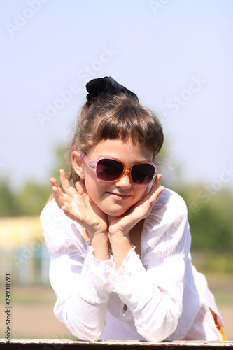 Beautiful little girl in sunglasses