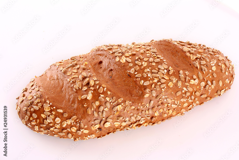 Bread with sunflower seeds isolated on white Bread with sunflower seeds isolated on white