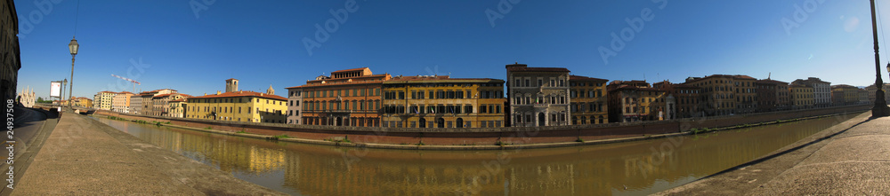 panoramic view across the river arno in pisa, italy