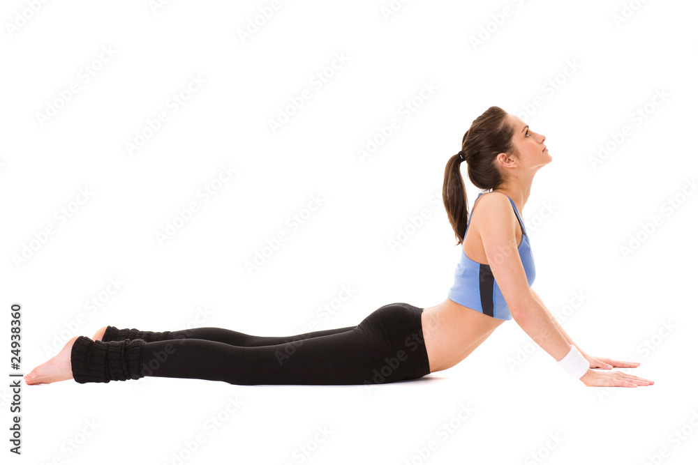 young female doing some exercises on white floor, isolated young female doing some exercises on white floor, isolated