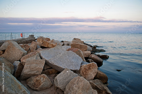 Sunset on the Baltic sea coast with stones