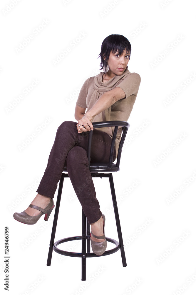 Beautiful Woman Posing on a Chair Beautiful Woman Posing on a Chair