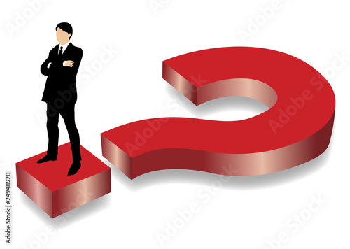 Business man standing on big red question mark photo