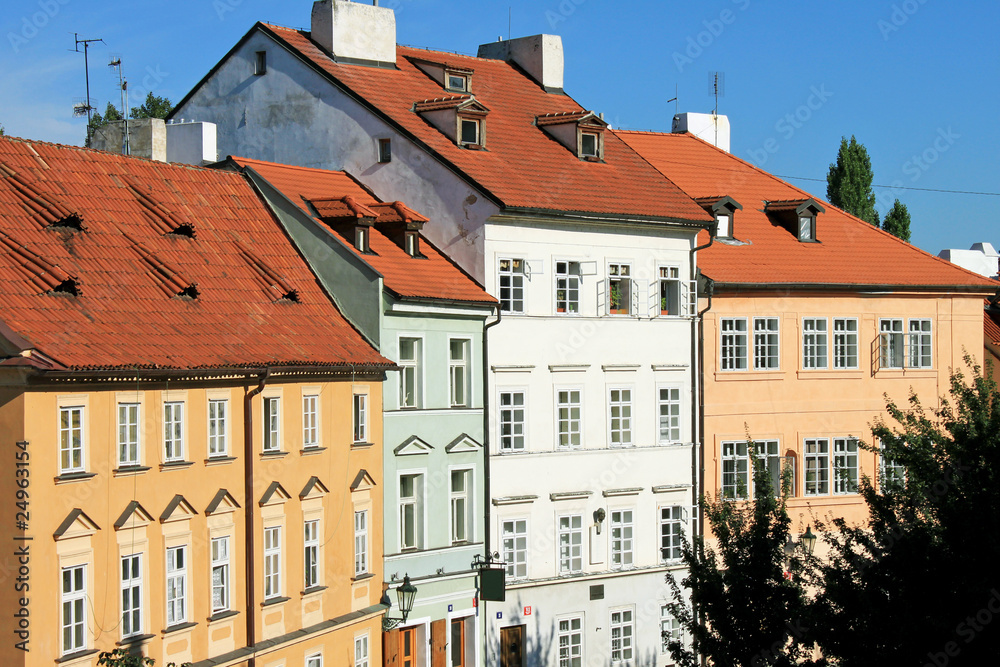 Beautiful Czech colorful houses in blue sky
