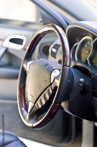 Salon expensive car. Leather-covered steering wheel © Oleg Fedorov