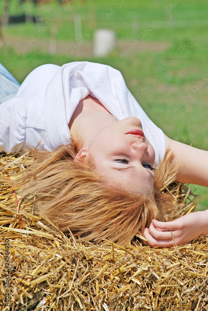 beautiful girl on a hay bale beautiful girl on a hay bale