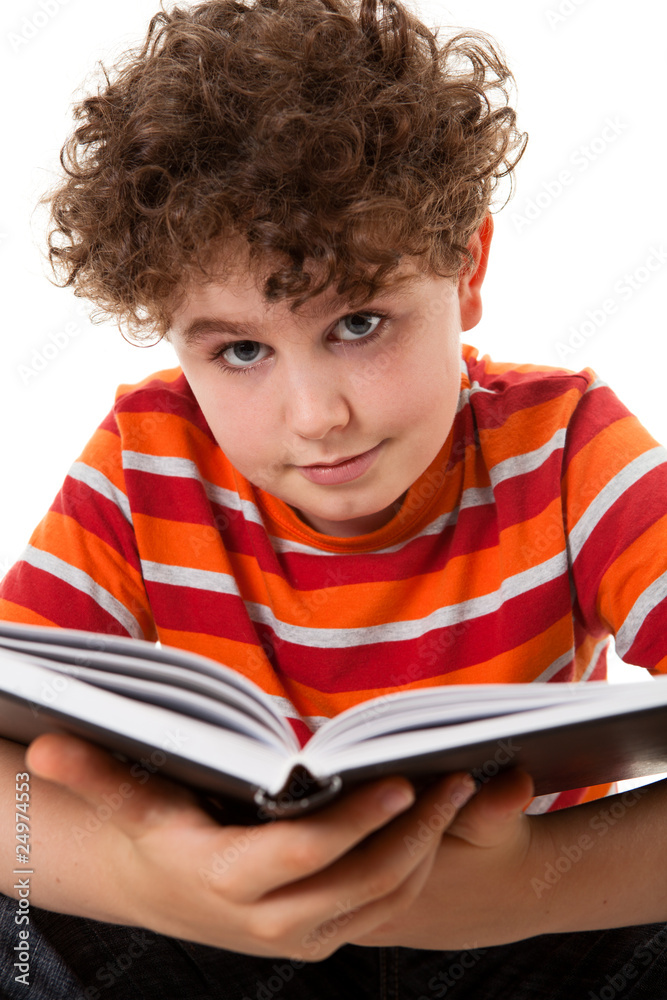 Boy reading book isolated on white background Boy reading book isolated on white background