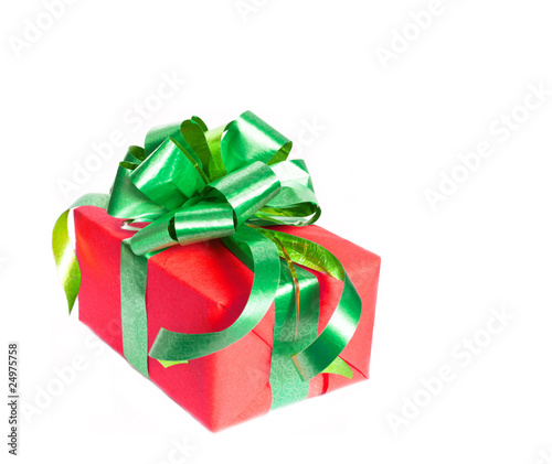 Gift box with green ribbon and a rose isolated on a white backgr