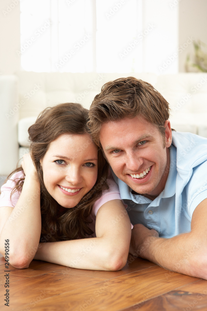 Affectionate Couple Relaxing At Home Together Affectionate Couple Relaxing At Home Together