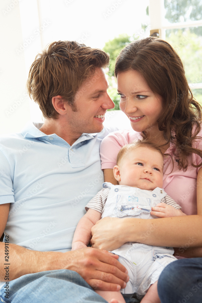 Parents Cuddling Newborn Baby Boy At Home Parents Cuddling Newborn Baby Boy At Home