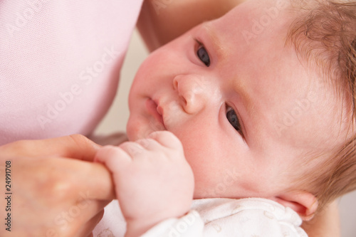 Close Up Of Baby Boy Holding Mothers Hand