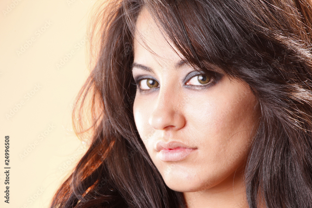 Fototapeta premium Head shot of a cute brunette