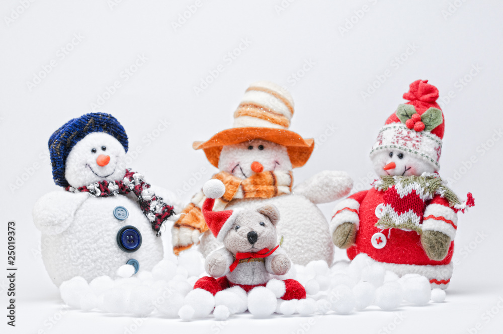 Christmas Teddy with three Snowmen on a white background. Christmas Teddy with three Snowmen on a white background.