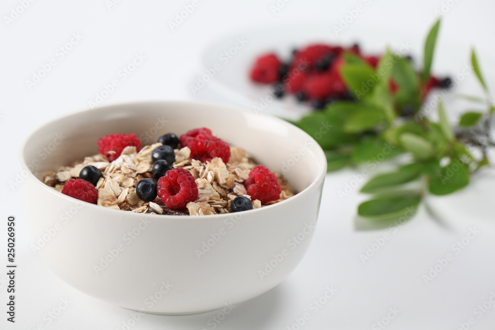 Granola with raspberries and blueberries Granola with raspberries and blueberries