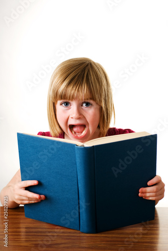child shocked at book © photos1st