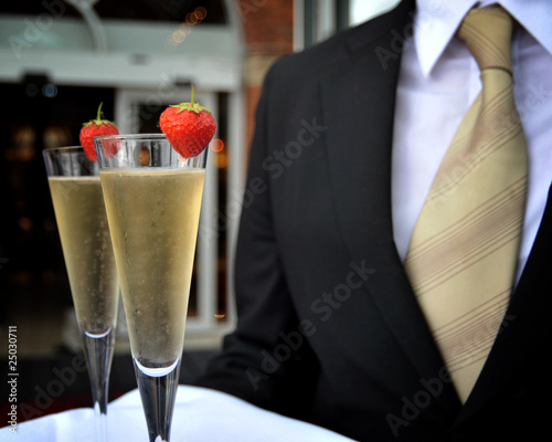Champagne in flutes with strawberries