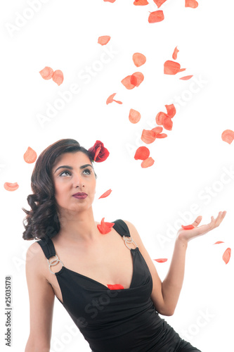 Middle asian girl with rose petals