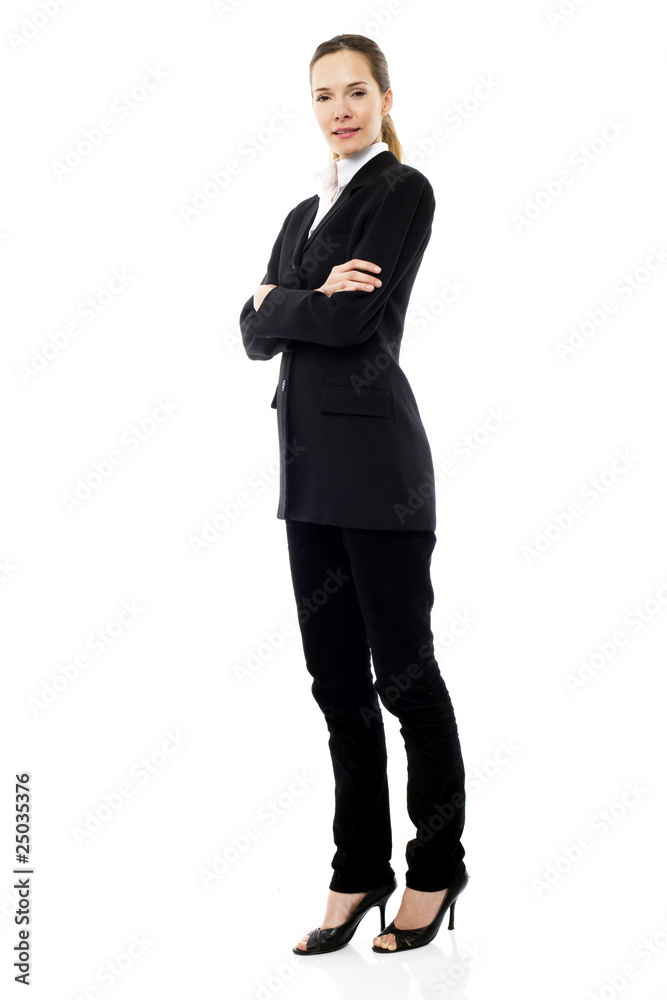 Young businesswoman standing with arms crossed Young businesswoman standing with arms crossed