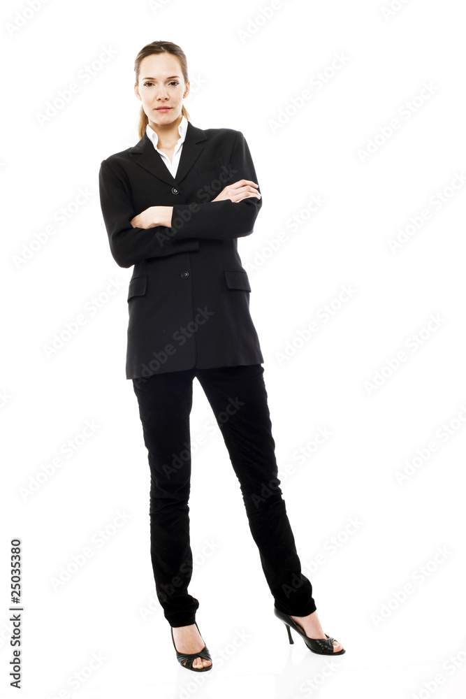 Young businesswoman standing with arms crossed Young businesswoman standing with arms crossed