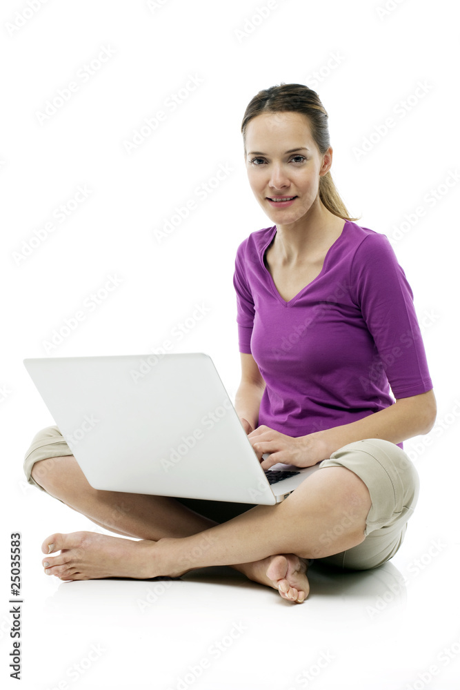 Young woman sitting on the floor with laptop Young woman sitting on the floor with laptop