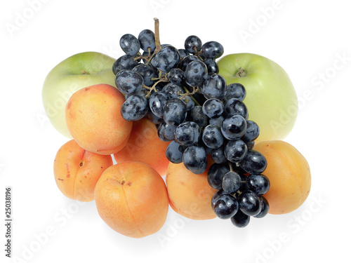 Grapes, apricots and apples isolated on a white background