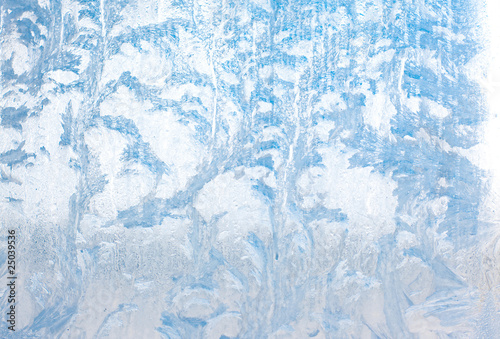 Frosty natural pattern on winter glass
