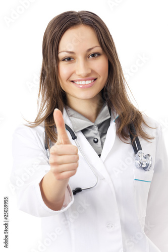 Happy female doctor with thumbs up  isolated on white