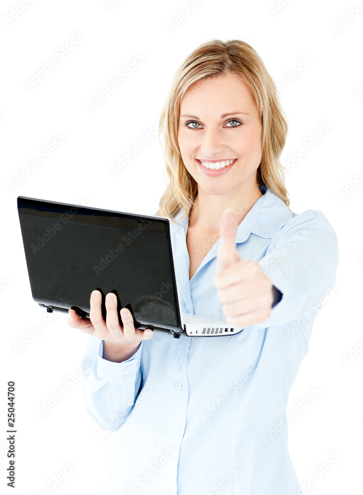 Jolly young businesswoman holding a laptop with thumb up Jolly young businesswoman holding a laptop with thumb up