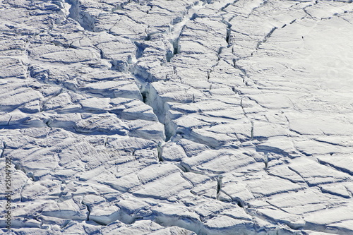 Surface of a flowing glacier. Aerial view. Arctic region