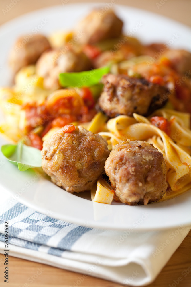 Pappardelle pasta with tomato sauce and meat balls