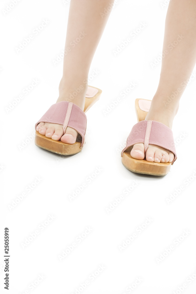 A Young Girl Walking In Mummy 's Shoes