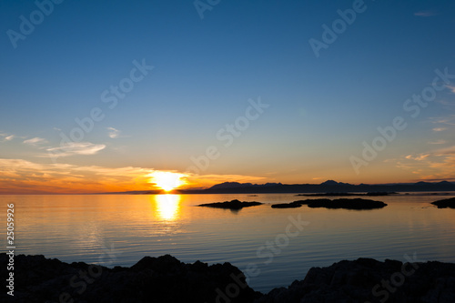 Sunset over the point of Sleat on the Isle of Skye photo