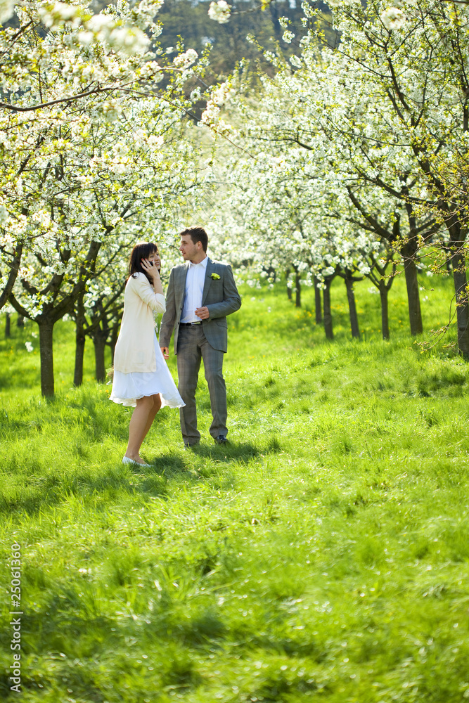 just married in a flowering garden